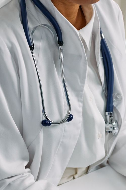 Physician in White Coat with Stethoscope